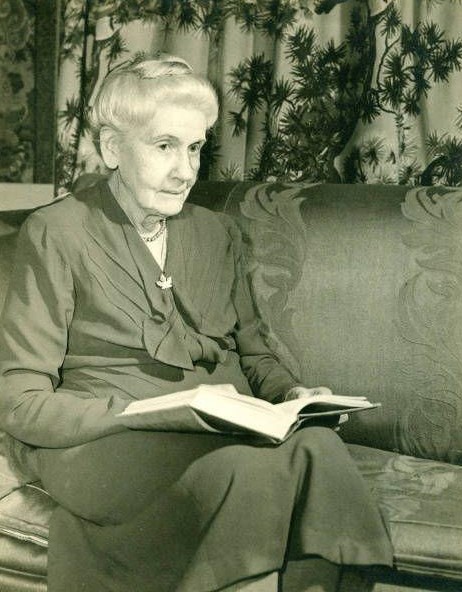 Linda Eastman, retired, reading at her home in Cleveland Heights, ca. 1950.